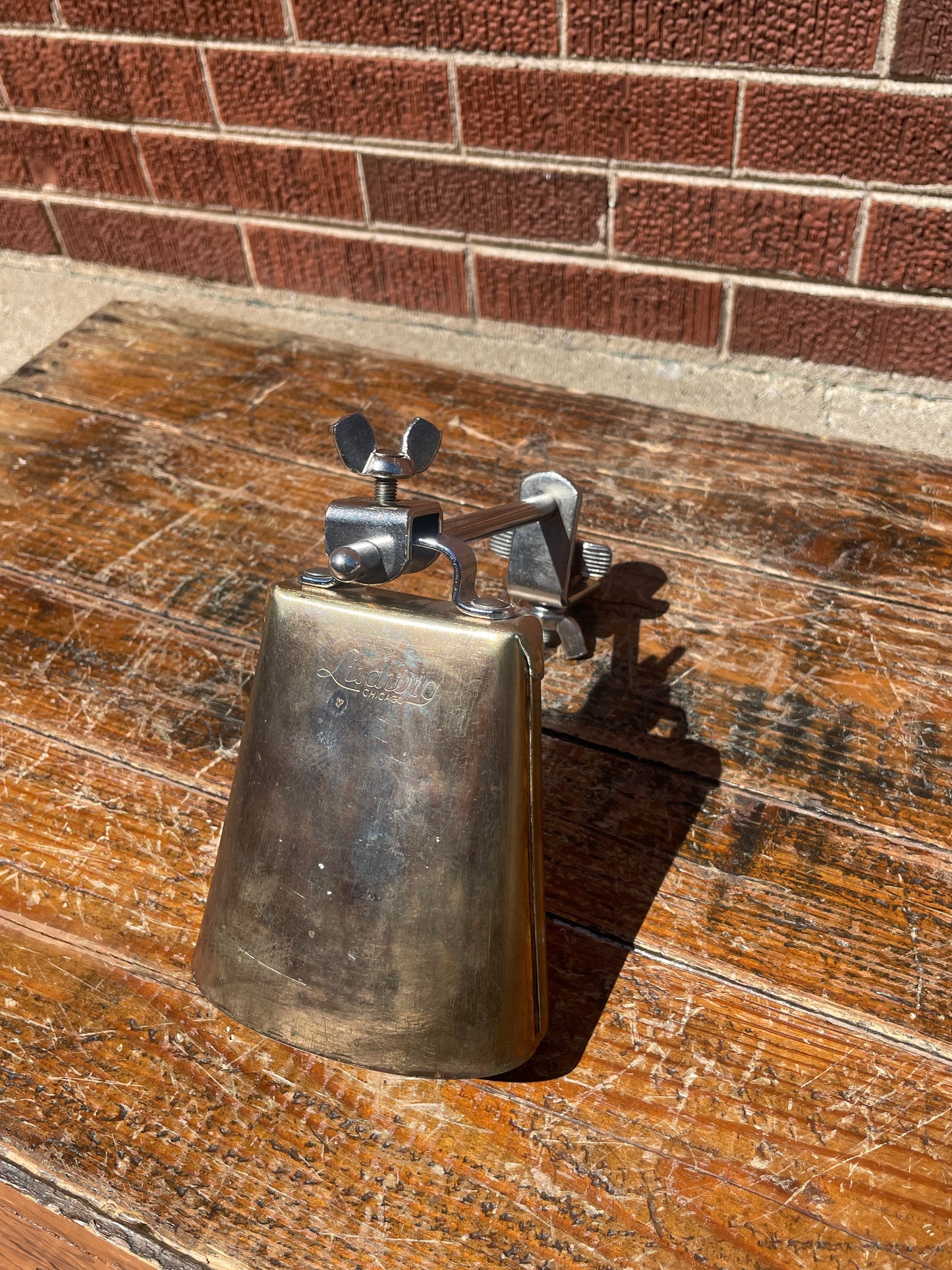 1960s Ludwig No. 129 5" Golden Tone Cow Bell w/ No. 133 Cowbell Holder Script Logo