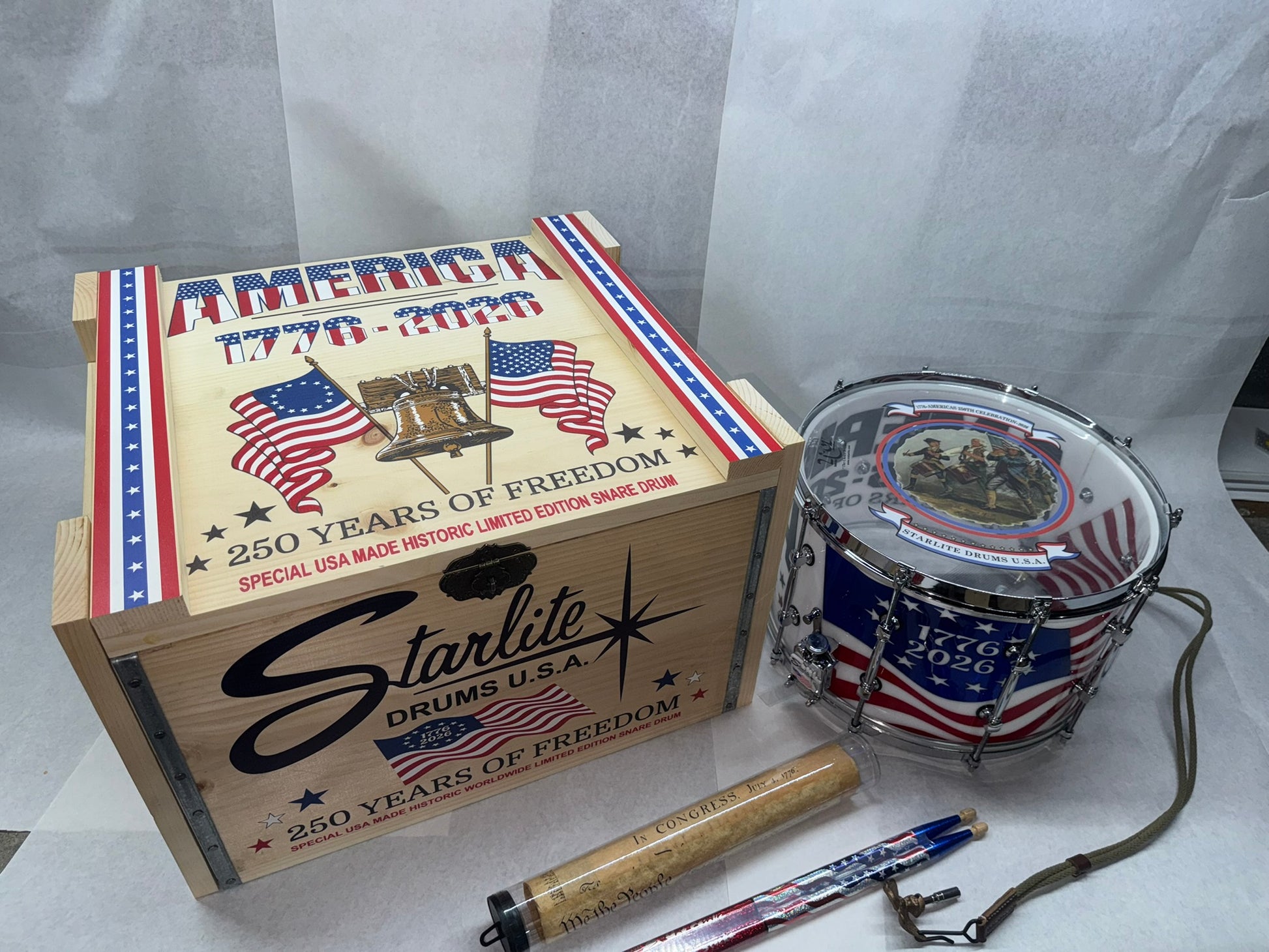 RCI Starlite 250th Anniversary open commemorative box with drum, key, and sticks